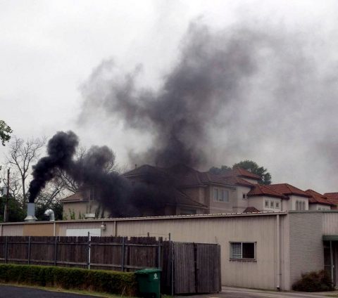 A crematorium sits next to homes in Houston, the only major US city without zoning laws